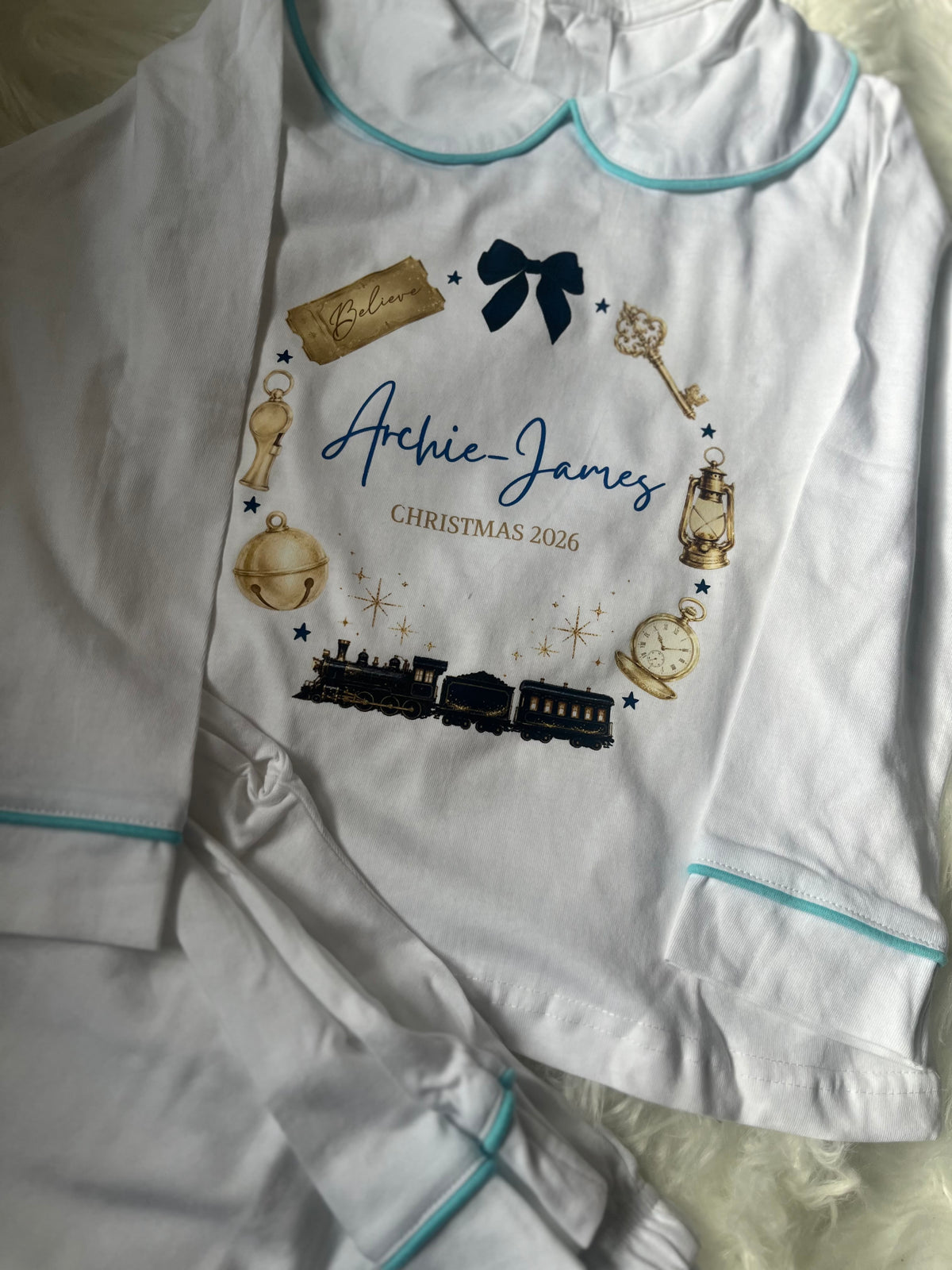 Personalized Christmas Pyjamas with collar and blue trim – Train Design in blue