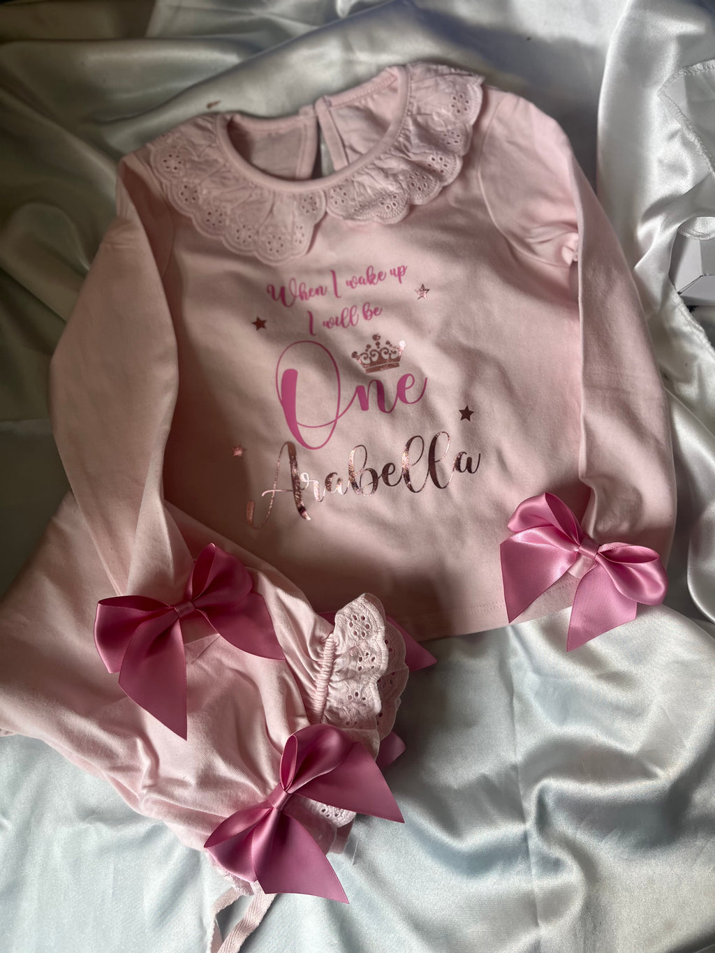 Personalised pink frill pyjamas with bows