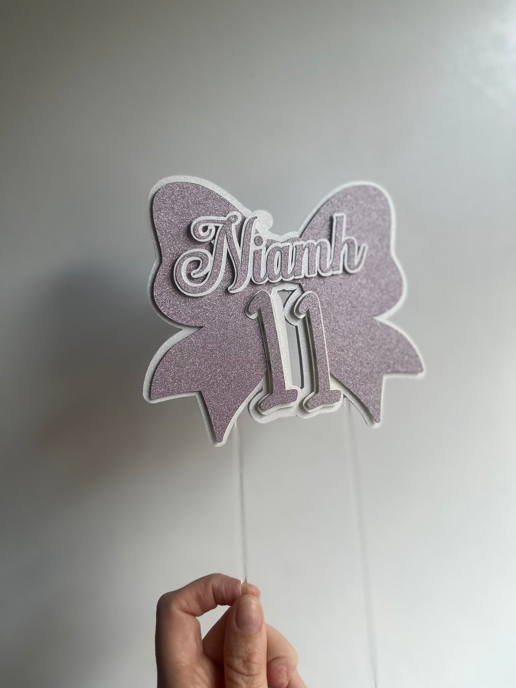 Personalised glitter bow cake topper
