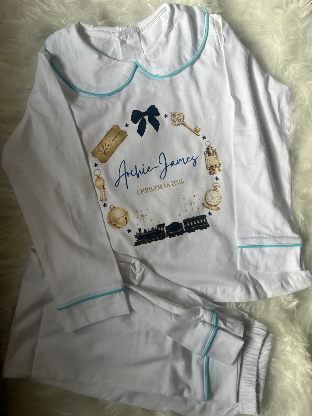 Personalized Christmas Pyjamas with collar and blue trim – Train Design in blue